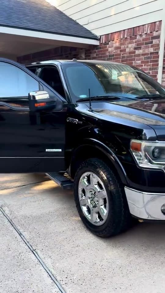Walkaround video of a detailed black Ford F-150, outside and inside